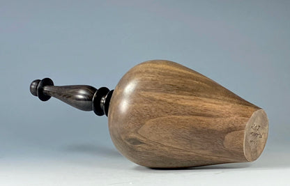 VESSEL TURNED FROM CLARO WALNUT, WITH AFRICAN BLACKWOOD FINIAL