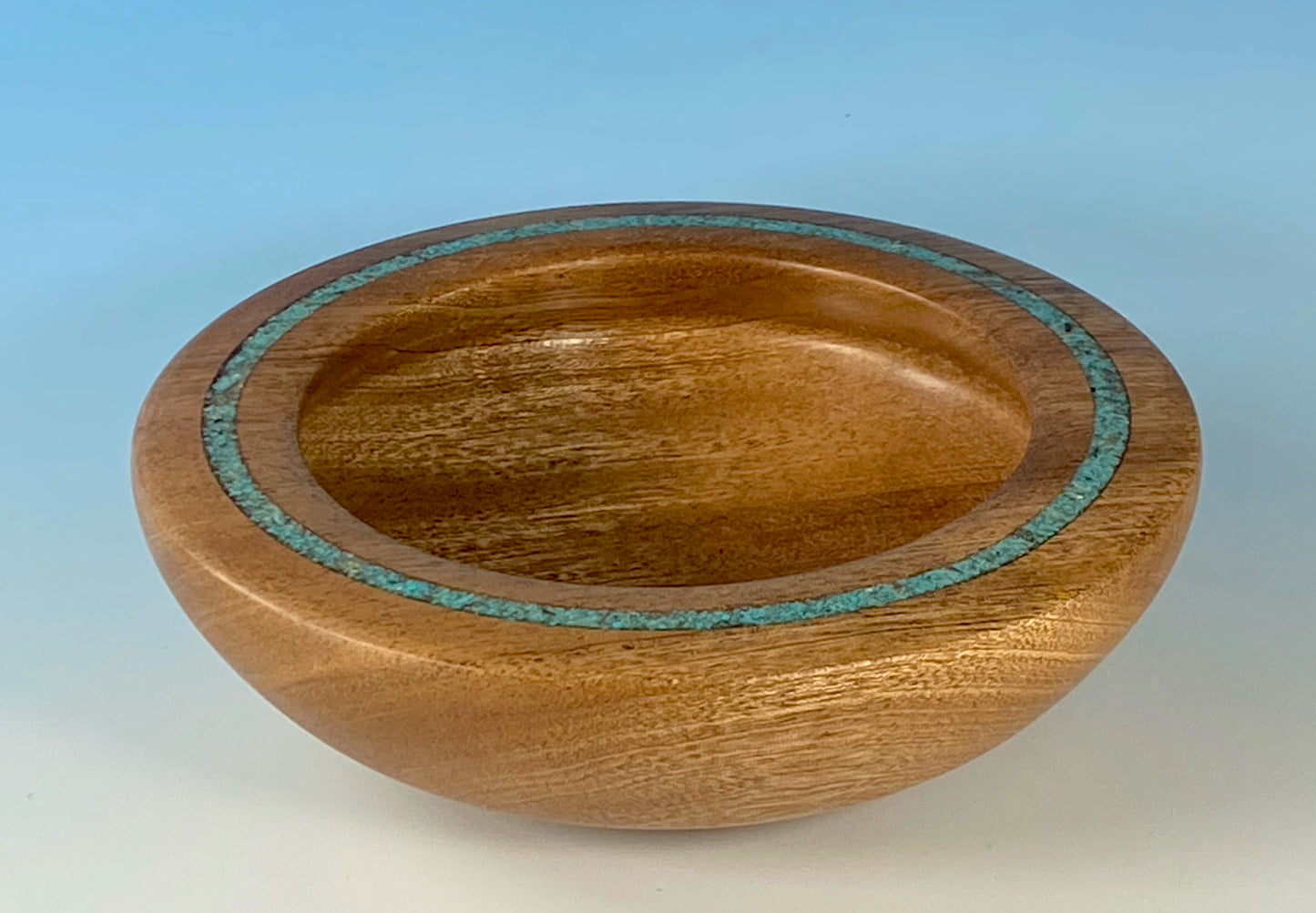 ENCLOSED FORM TURNED FROM SAPELE, WITH TURQUOISE INLAY